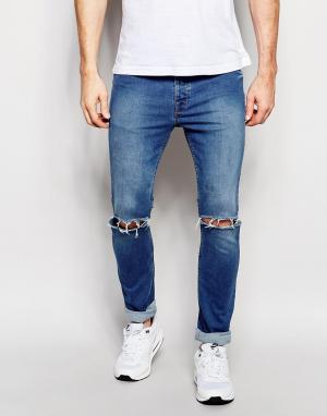 Облегающие джинсы с рваными коленками Hype. Цвет: синий