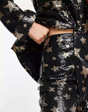 Черные узкие брюки с расклешенными звездами и пайетками Asos. Цвет: черный