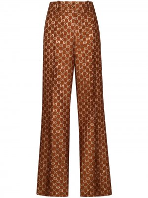 Расклешенные жаккардовые брюки с узором GG Gucci. Цвет: коричневый