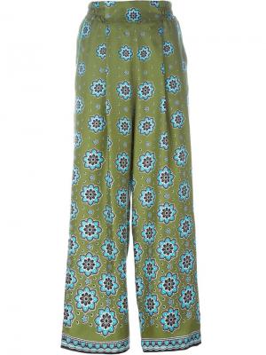 Расклешенные брюки с цветочным принтом For Restless Sleepers. Цвет: зелёный