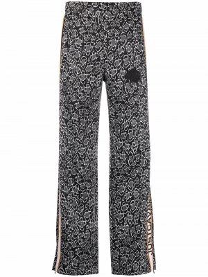 Расклешенные брюки с логотипом и леопардовым принтом Just Cavalli. Цвет: черный