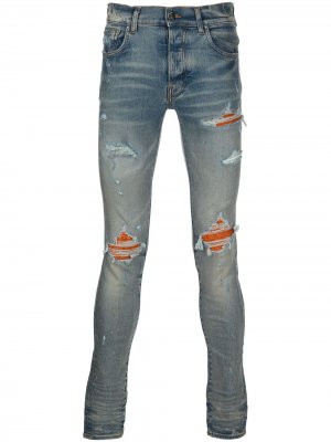 Distressed skinny-cut jeans AMIRI. Цвет: синий