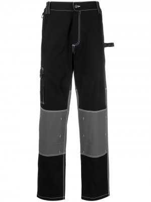 Двухцветные брюки United Standard. Цвет: черный