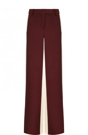 Шелковые расклешенные брюки с карманами Valentino. Цвет: бордовый
