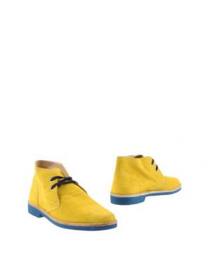 Полусапоги и высокие ботинки SIMONE MARIOTTI. Цвет: желтый