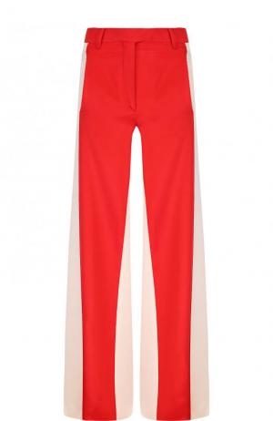 Шелковые расклешенные брюки с карманами Valentino. Цвет: красный