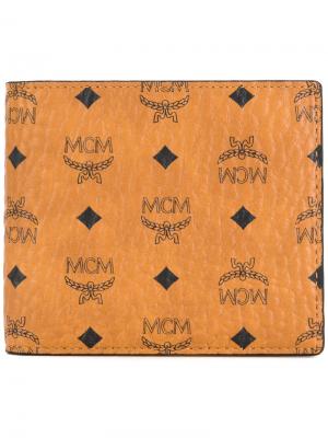 Бумажник с узором из логотипов MCM. Цвет: коричневый
