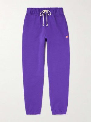 СДЕЛАНО в США Зауженные спортивные штаны из хлопкового джерси с аппликацией логотипа NEW BALANCE, фиолетовый Balance