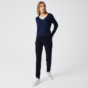 Брюки и шорты Женские джинсы Slim fit с высоким поясом Lacoste. Цвет: синий