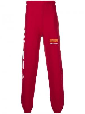Спортивные брюки с логотипом Heron Preston. Цвет: красный