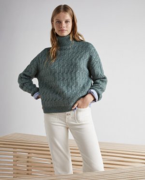 Женский свитер с водолазкой и косой вязки Green Coast
