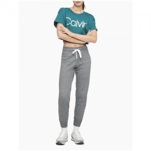 Джоггеры XL темно-серые на флисе с белыми завязками Calvin Klein. Цвет: серый