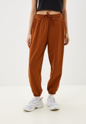 Брюки спортивные PUMA Lamoda Online Exclusive DOWNTOWN Relaxed Sweatpants TR. Цвет: коричневый