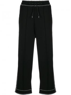 Укороченные спортивные брюки с контрастной отделкой McQ Alexander McQueen. Цвет: черный