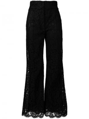 Расклешенные брюки из цветочного кружева Dolce & Gabbana. Цвет: черный