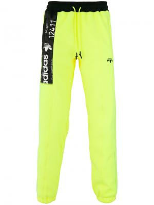 Спортивные брюки с контрастной панелью Adidas Originals By Alexander Wang. Цвет: желтый