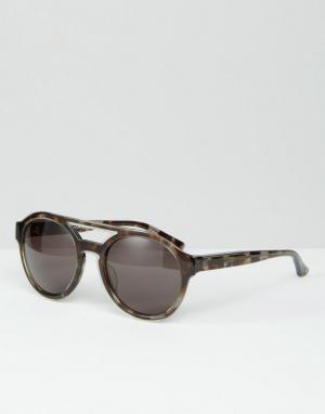 Солнцезащитные очки в круглой черепаховой оправе Sun Calvin Klein. Цвет: коричневый