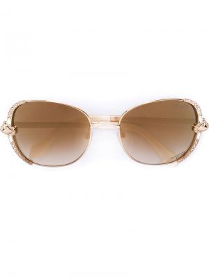 Солнцезащитные очки в декорированной оправе Roberto Cavalli. Цвет: металлический