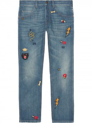 Зауженные джинсы с нашивками Gucci. Цвет: синий