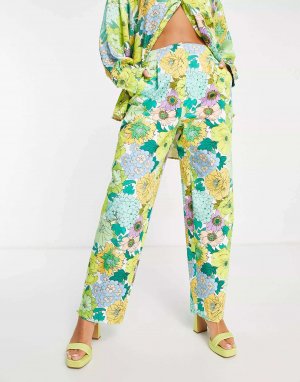 Хлопковые зауженные брюки с цветочным принтом в стиле ретро ASOS