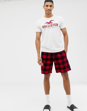 Подарочный комплект для дома красного/белого цвета из шортов в клетку и футболки с логотипом Hollister. Цвет: мульти