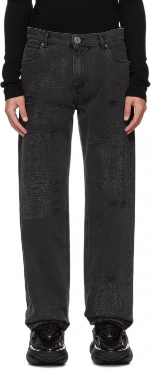 Черные рваные джинсы Balmain