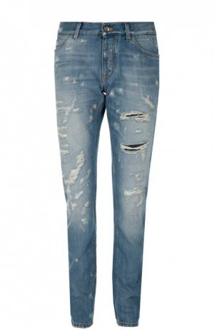 Зауженные джинсы с потертостями и нашивкой Dolce & Gabbana. Цвет: синий