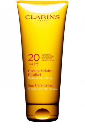 Солнцезащитный крем для лица и тела Crème Solaire Confort SPF 20 Clarins. Цвет: бесцветный