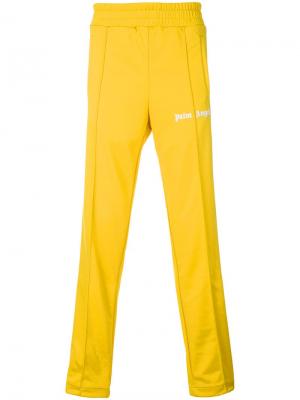Спортивные брюки с боковыми полосками Palm Angels. Цвет: желтый