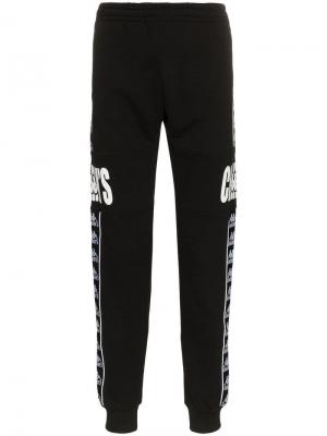 Спортивные брюки с логотипом и вставкой сбоку Charm's. Цвет: черный