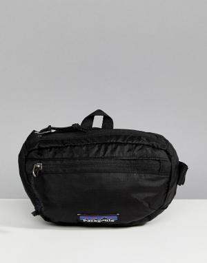 Легкая черная сумка-кошелек на пояс Patagonia. Цвет: черный