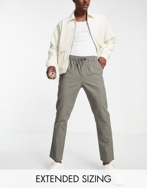 Узкие брюки чинос цвета хаки с эластичной талией ASOS DESIGN