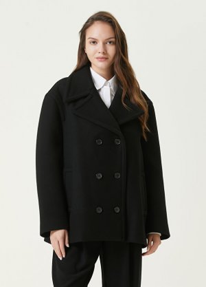Черное двубортное шерстяное пальто Valentino. Цвет: черный
