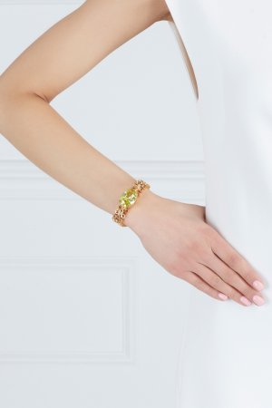 Позолоченный браслет с кристаллом Mawi. Цвет: золотой