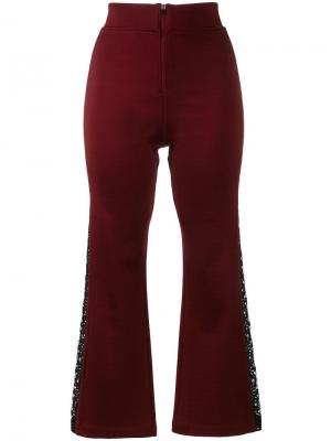 Расклешенные брюки с кружевными вставками Ganni. Цвет: розовый и фиолетовый