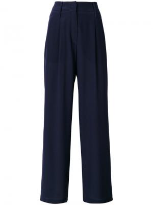 Расклешенные классические брюки Odeeh. Цвет: синий