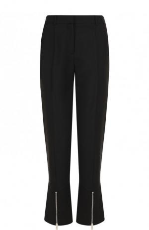Укороченные расклешенные брюки с металлическими молниями Givenchy. Цвет: черный