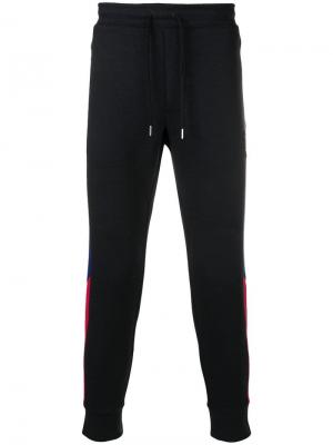 Спортивные брюки с боковыми полосками Polo Ralph Lauren. Цвет: черный