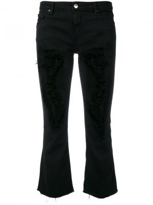 Рваные укороченные джинсы с расклешенными голенищами Iro. Цвет: чёрный