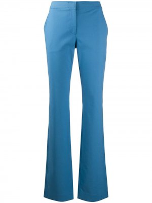 Расклешенные брюки средней посадки Moschino. Цвет: синий