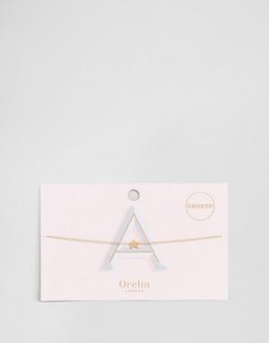 Ожерелье-чокер из цепочки с подвеской в виде буквы А Orelia. Цвет: золотой