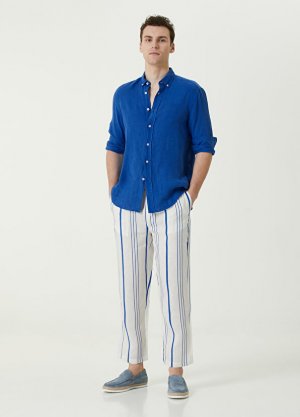 Бело-синие льняные брюки в полоску с шнуровкой на талии Peninsula. Цвет: синий